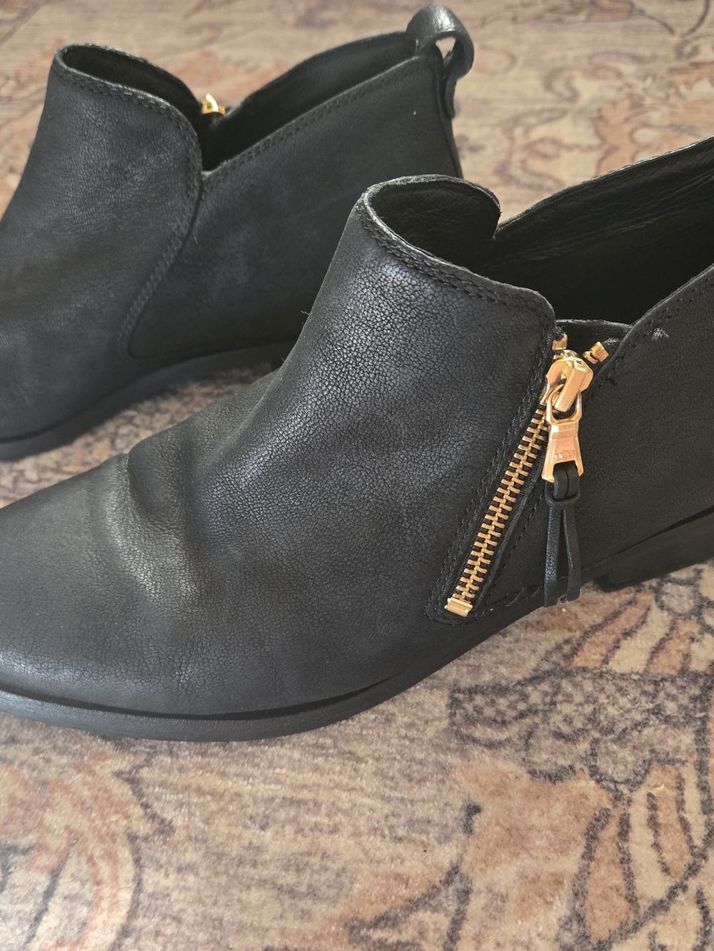 UGG Black Leather Ankle Booties with Gold Side Zip